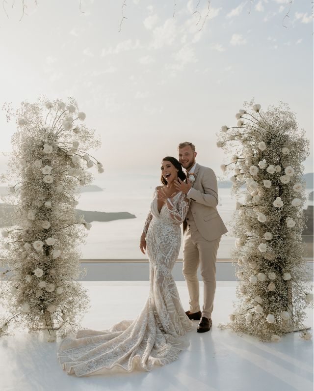 Lindsey @lindseybakerdora and Scott’s @scott.baker93 wedding was beyond magical — a true fairytale come to life! The Santorini Caldera provided an enchanting backdrop for the couple’s photo shoot, capturing the essence of their love in all its mesmerizing beauty. The @santorini_gem venue was truly stunning and made for the perfect location for their unforgettable ceremony.

Photography @ispiru
Wedding planner @charlottemayweddings
Flowers @weddingwishsantorini
Videography @magic_videography
Venue for wedding ceremony @santorini_gem
MUAH @juliapopovamuah
Music 🎶 @irwaneasty
Wedding dress @florianni_official 
 #santorinielopement #destinationwedding #santoriniweddings #santoriniwedding #photographeringreece #santoriniphotographer #weddinginsantorini
#santorinibride #weddingingreece #greecewedding #santoriniweddingphotographer
#greeceweddingphotographer #santoriniphotographer
#engagementingreece #elopementsantorini #elopementphotographer